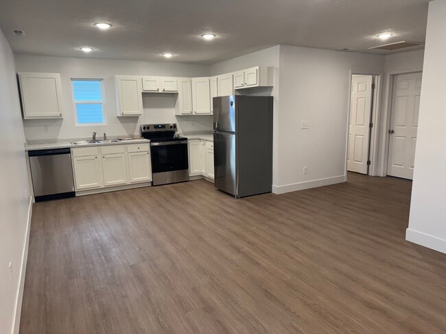 Kitchen - Sunrise Suites Apartments