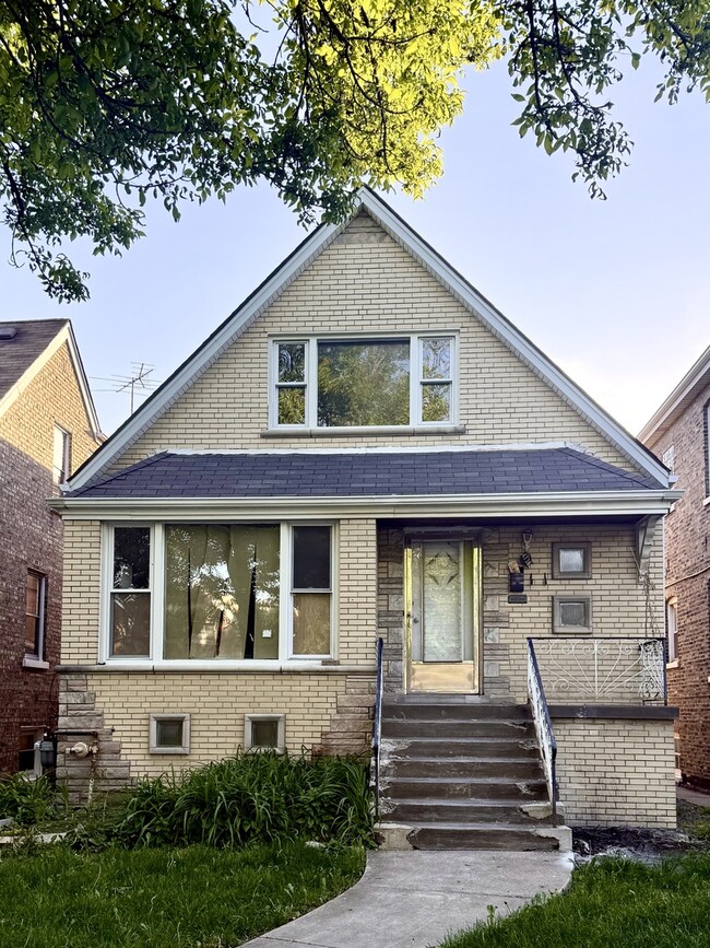 Building Photo - 4736 S Tripp Ave Unit 2