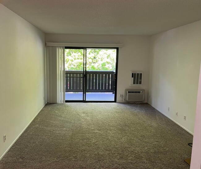 Living Room & Balcony - 1493 Marchbanks Dr Unit #4