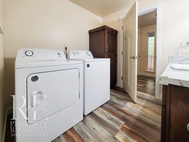 Photo - Modernized Two-Story with Open Layout, Gas Fireplace & Large Fenced Yard