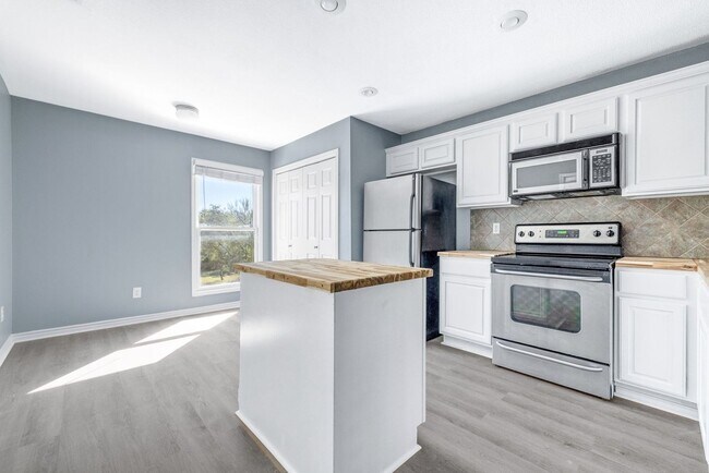 Photo - Carriage Place Square Unit 102