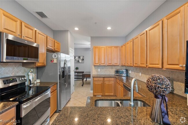 Building Photo - 10646 Smoke House Bay Dr Unit 201