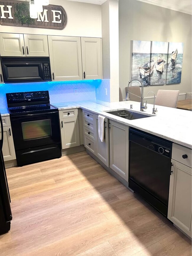 Building Photo - 20310 Estero Gardens Cir Unit 204