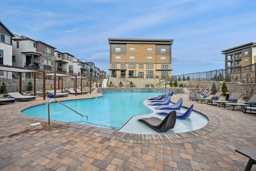 Resort-style Pool - Resort-style pool with sun shelf, cabanas and grills for relaxing and entertaining close to home.