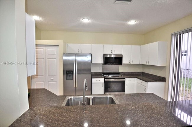 Building Photo - 6161 NW 58th Way