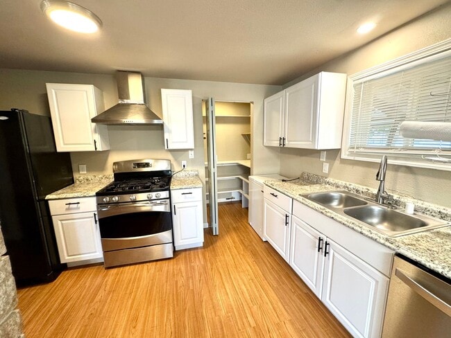 Photo - Spacious 4-Bed, 2-Bath Duplex – Utilities ...
