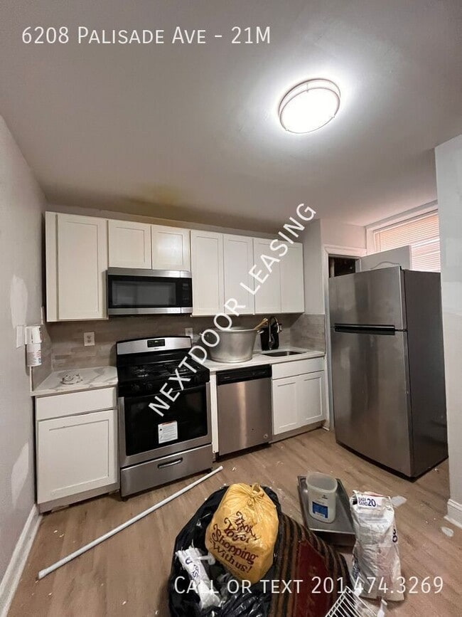 Building Photo - 6208 Palisade Ave Unit 21M