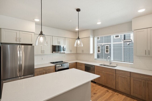 Building Photo - Modern 4-Bedroom Townhome with 2 Car Garage | 1800 Sq. Ft. | $3,490