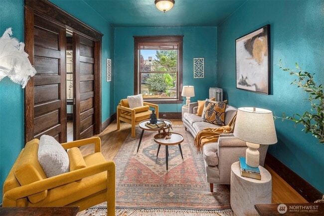 Living Room with Pocket Doors - 416 E Roy St Unit H