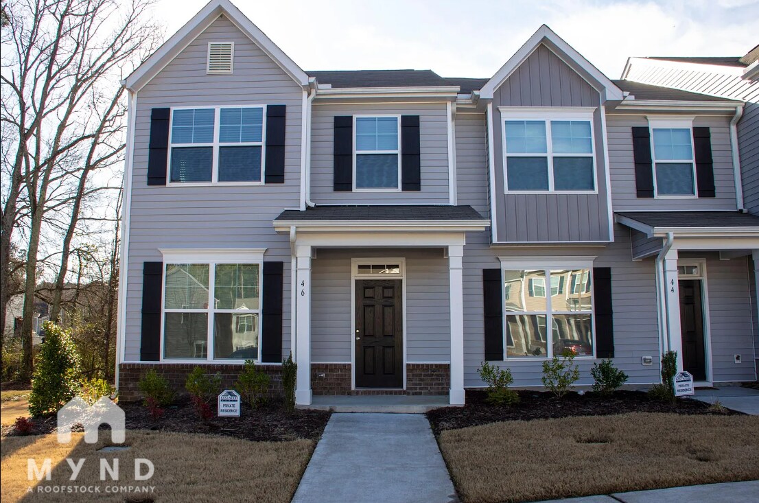 Photo - 102 Harvest Oaks Ln Townhome