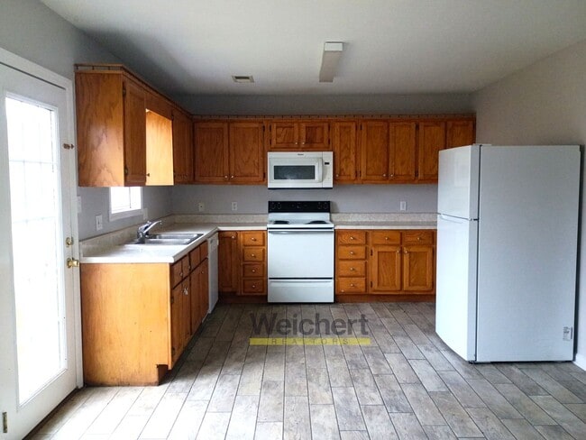 Photo - Spacious 3BR/2BA with Carport & Large Yard