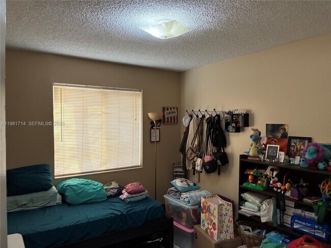 Photo - 10765 SW 4th St Unit 5