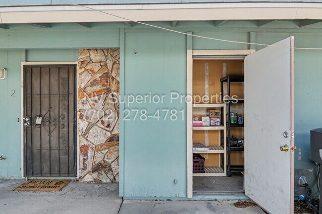 Photo - SE!! Close to UNLV!! 2 Bedroom 2 story!! 1 Car Carport!! Fully Furnished!! Community Pool!! and T...