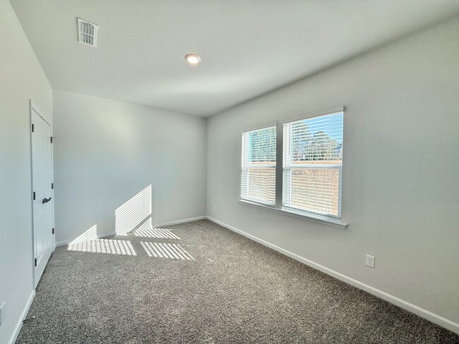 Photo - Stunning New Construction 4BD, 3.5BA Apex Townhome with a 2-Car Garage in a Prime Location Near T...