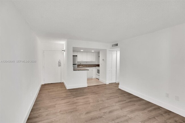 Building Photo - 4335 NW S Tamiami Canal Dr Unit 201