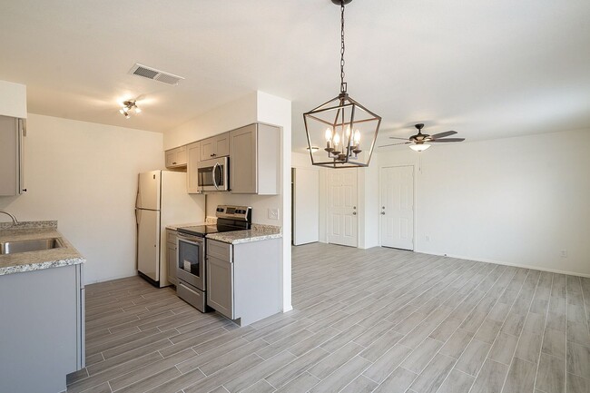 Updated home with large backyard & 2 car g... - Updated home with large backyard & 2 car g...