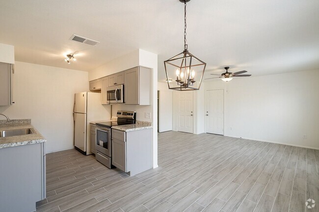 Building Photo - Updated home with large backyard & 2 car g...