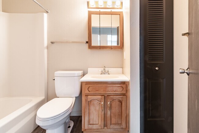 Updated Apartments Featuring Carpeted Bedrooms, Neutral Paint Schemes, Granite Style Countertops, Hardwood Style Floors, Shaker Style Cabinets, Matching Black Appliances, Spacious Closets