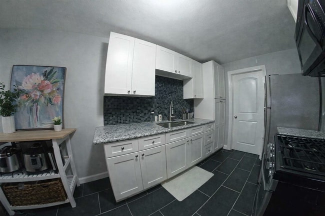 Photo - Close to Shopping Center + Granite Countertops + Shared Off-Street Parking! Available August 5th!