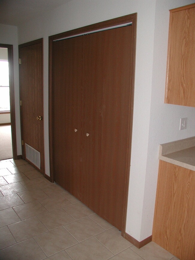 Hall with furnace & washer dryer doors