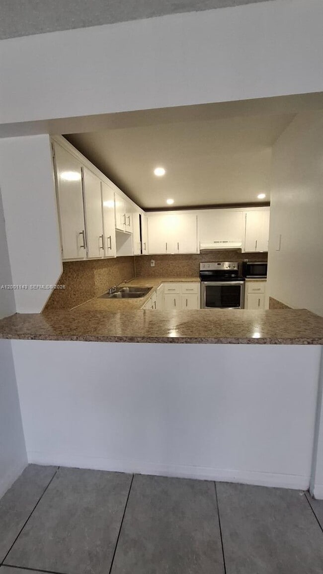 Building Photo - 6950 Miami Gardens Dr Unit 2-201
