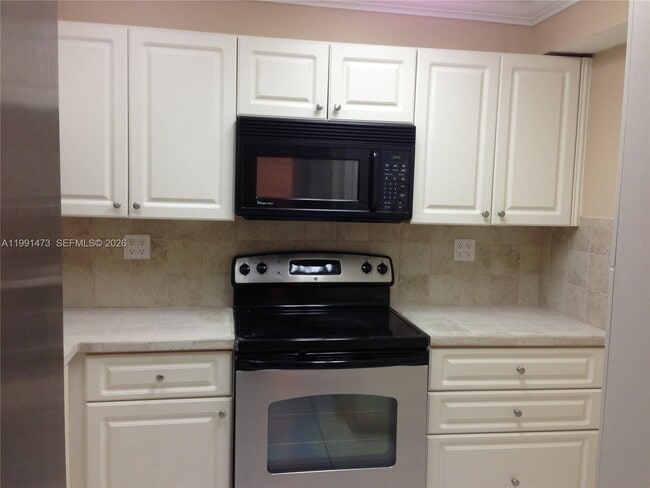 Building Photo - 11790 SW 18th St Unit 413-3