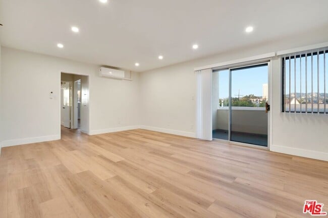 Building Photo - 1477 S Canfield Ave Unit 304