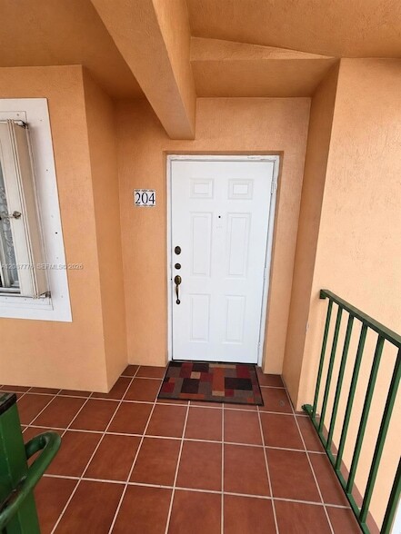 Building Photo - 4691 NW 9th St Unit 204