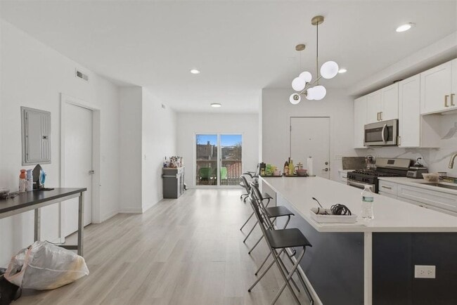 Photo - 4939 N St Louis Ave