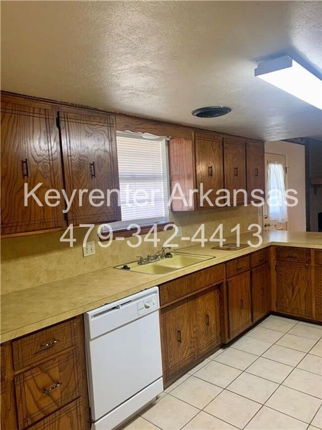 Photo - Charming Home with Open Kitchen, Fireplace & 2-Car Garage