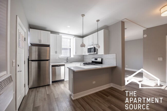 Building Photo - 3937 N Janssen Ave Unit E1