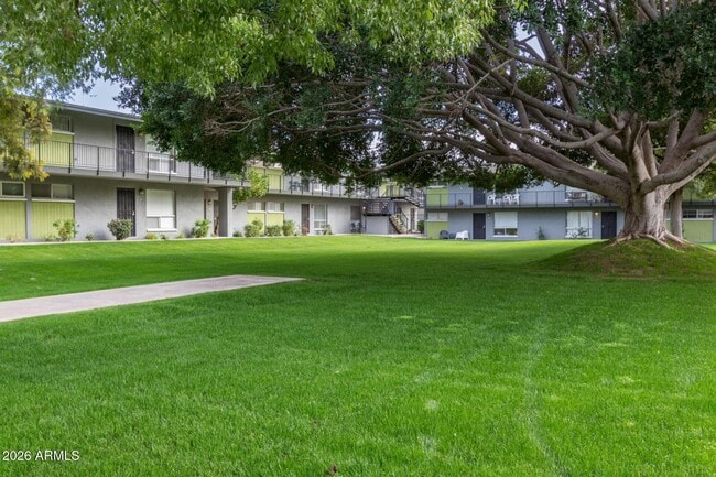 Building Photo - 7141 N 16th St Unit 234