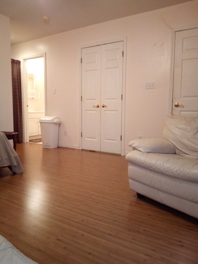 Area view with kitchenette doors closed - 1008 Martin Luther King Jr Dr Unit Studio Apartment B