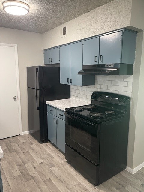 Kitchen - The Village Apartments