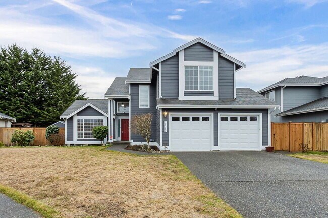 Photo - 4 bedrooms (one on the main floor), 2.5 bathrooms (one on the main floor next to the bedroom), Bo...