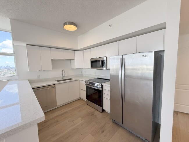 Photo - Rare 2/2 Corner Penthouse with Panoramic Lagoon Views from Every Room – Available Now! Unidad PH-01