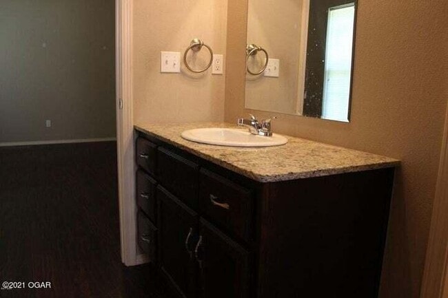 Photo - 5061a Raintree Cir Unit B