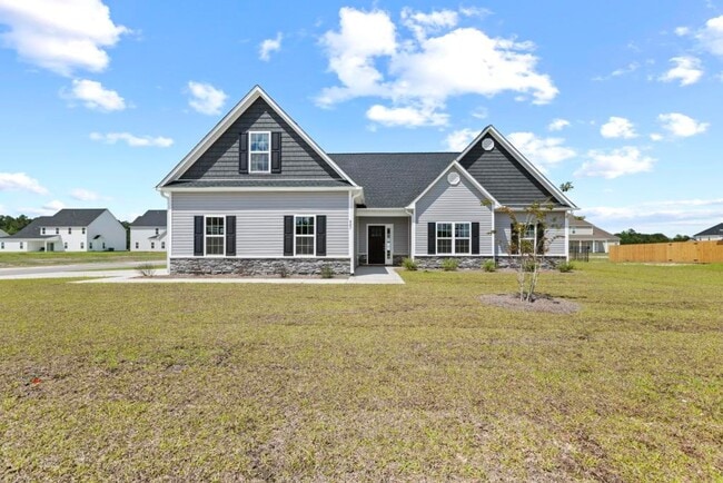 Building Photo - Like-New 4BR Home in Stateside with Pool Access & Side-Load Garage
