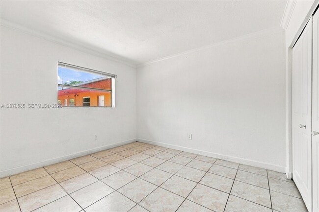 Building Photo - 1245 W 24th St Unit 223