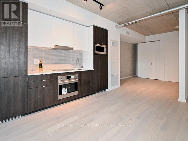 Photo - 21 Lawren Harris Square Unit 418