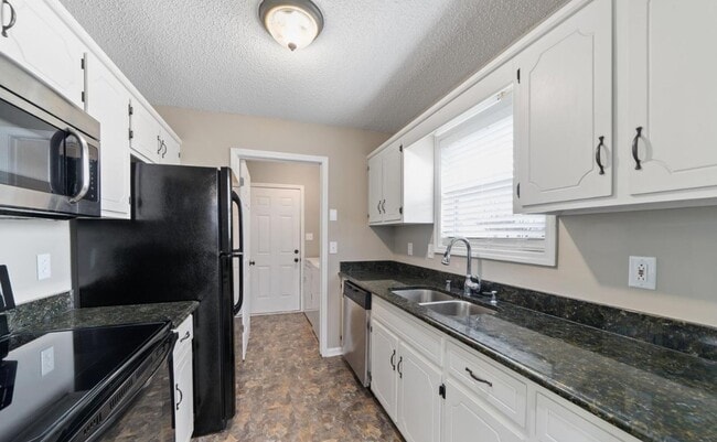 Photo - Fenced Backyard with a Shed!