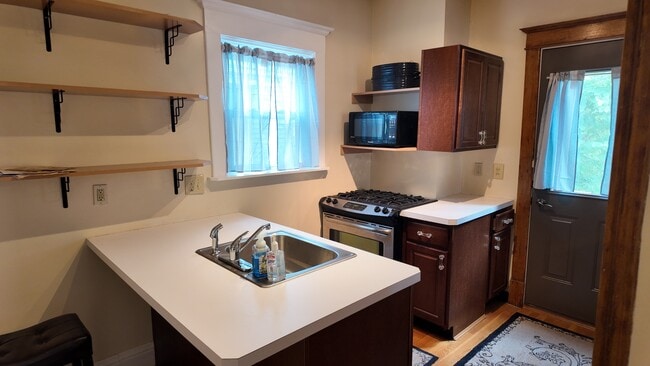 Photo - Spacious 4-Bed Home with Updated Kitchen, Deck & Fenced Yard in Cincinnati