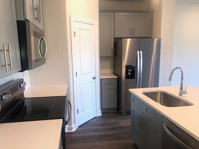 Photo - Newer Townhome with 1 Car Garage in Braemar Village! COMING SOON!