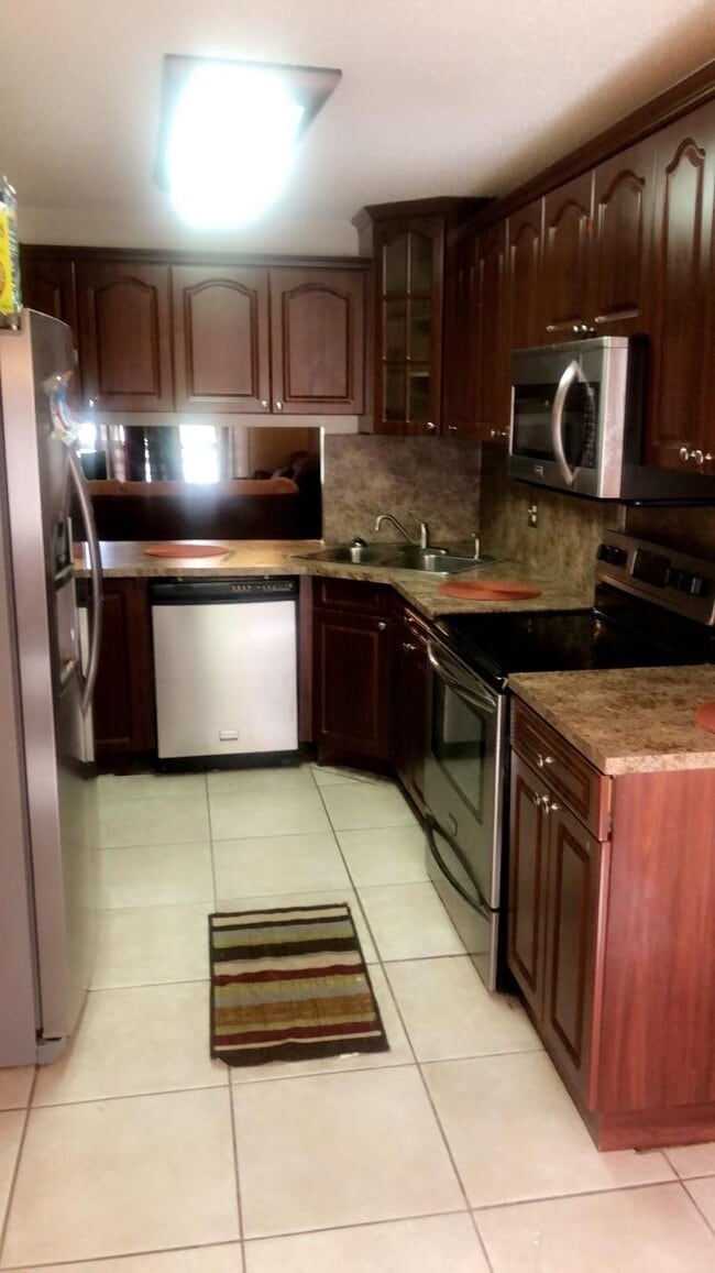 Building Photo - 615 NW 210th St Unit 203