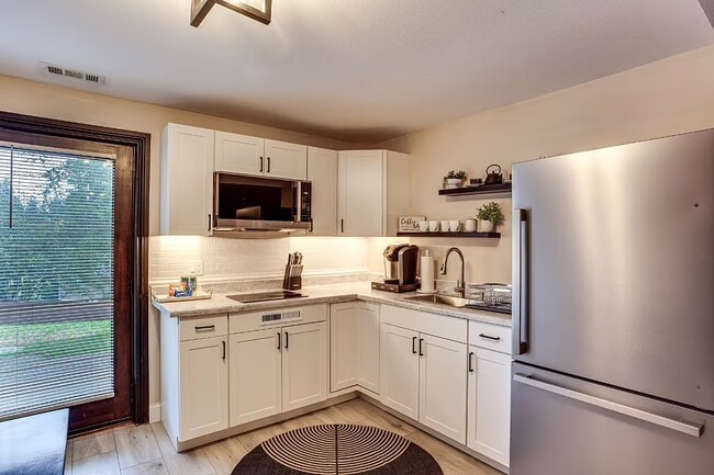 Photo - 6911 47th Street Ct W Unidad Starlight