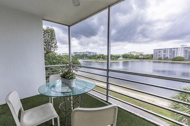 Building Photo - 2751 N Palm Aire Dr Unit 406 Rental
