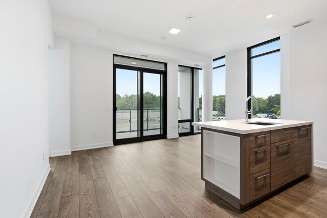 Building Photo - The Residences at Central Park Unit 208
