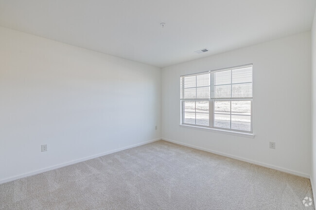 3BR, 2BA - 1,265SF - Primary Bedroom