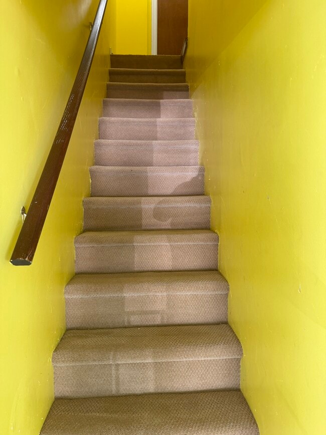 Stairs to apartment - 354 Ogden St Unit Floor 2 rear