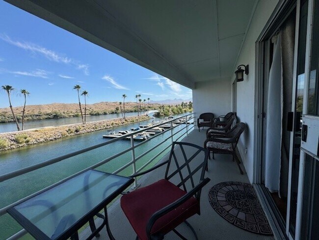 Photo - Riverfront 2BR 2BA Furnished Condo on GROUND LEVEL W/Garage and UTILITIES Included AVAIL 4/1/26 Unidad 36
